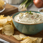 "Delicious sour cream onion dip recipe served with chips"